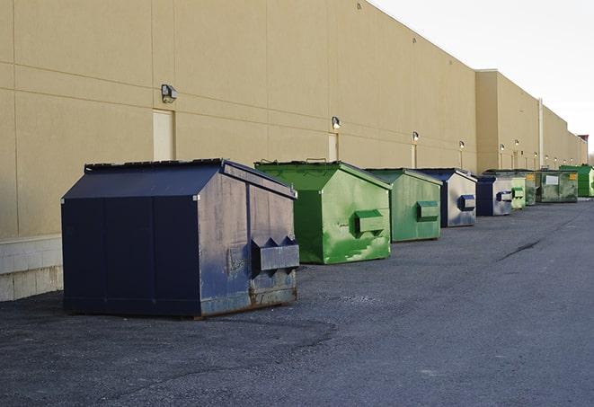 large construction dumpster positioned on a city street in Farmersville OH